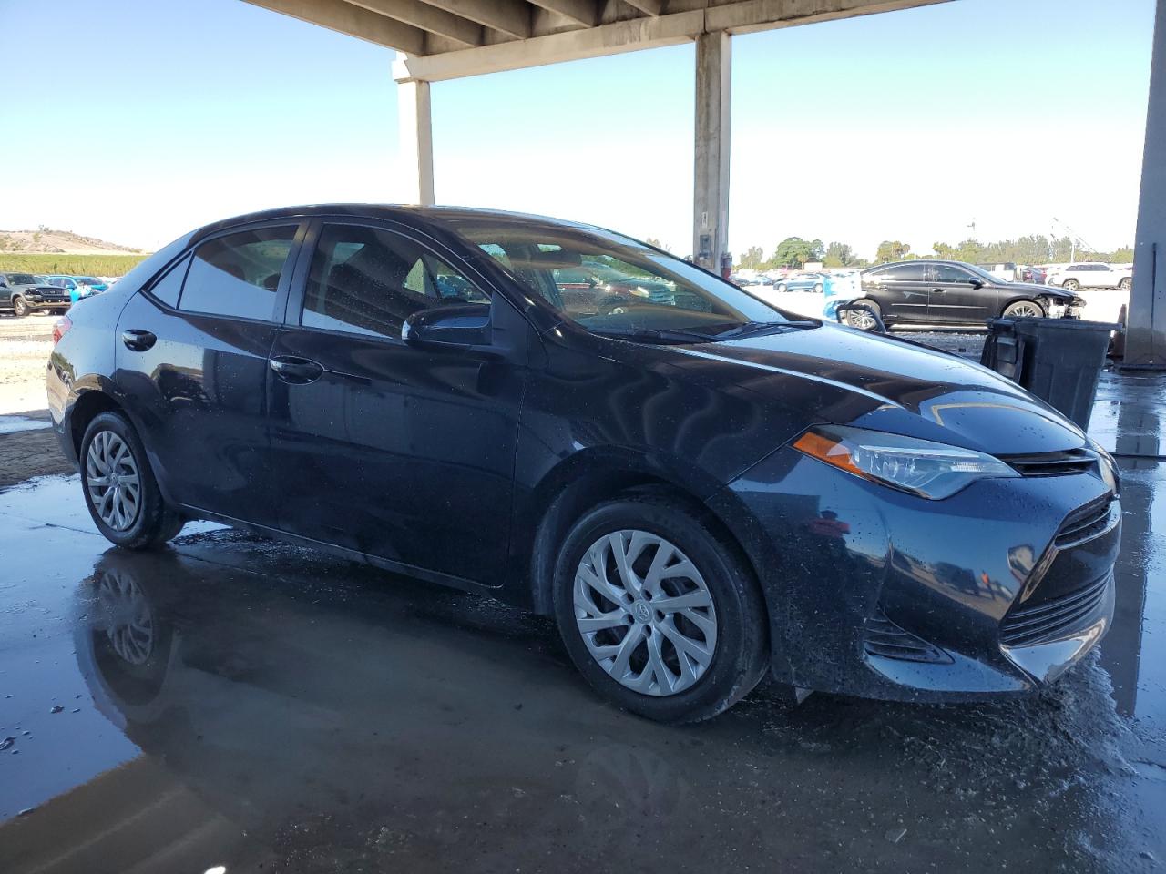 2019 Toyota Corolla VIN 5YFBURHE2KP902613 Copart auction photo, rear end / minor dent/scratches damage thumbnail 4