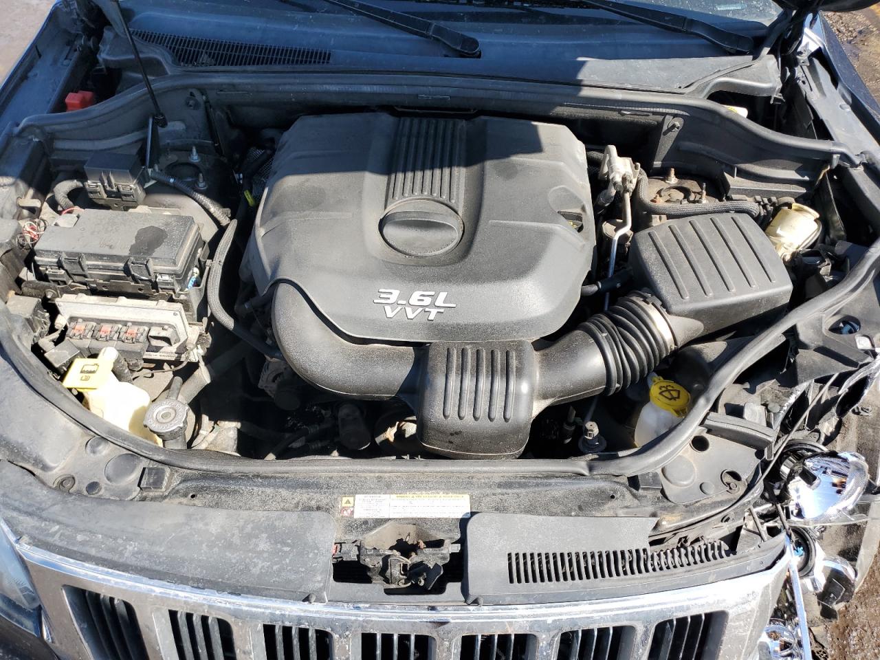 2012 Jeep Grand Cherokee VIN 1C4RJFAG4CC274307 Copart auction photo, front end / undercarriage damage thumbnail 12