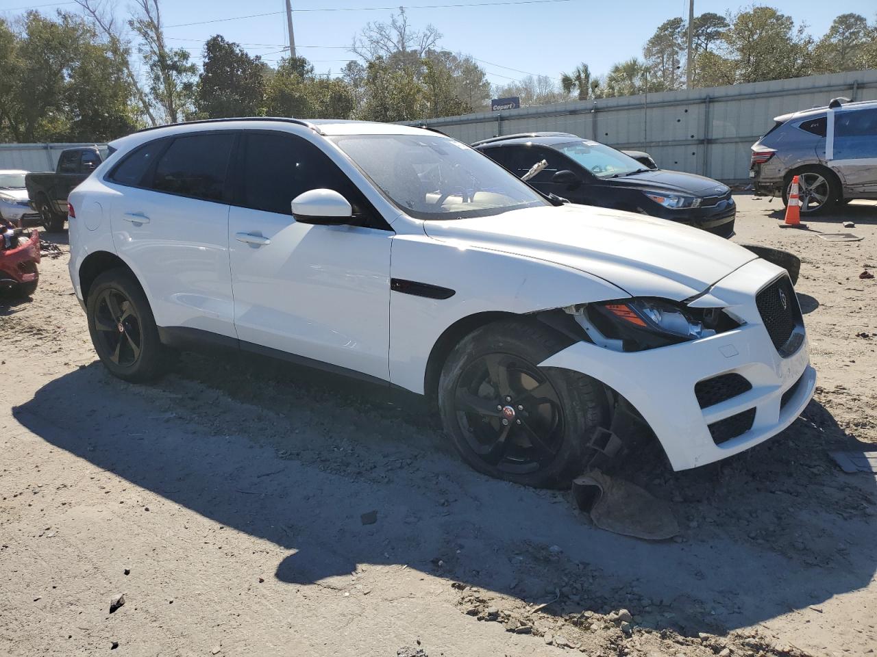 2019 Jaguar F-Pace VIN SADCJ2FX6KA397242 Copart auction photo, front end / side damage thumbnail 4