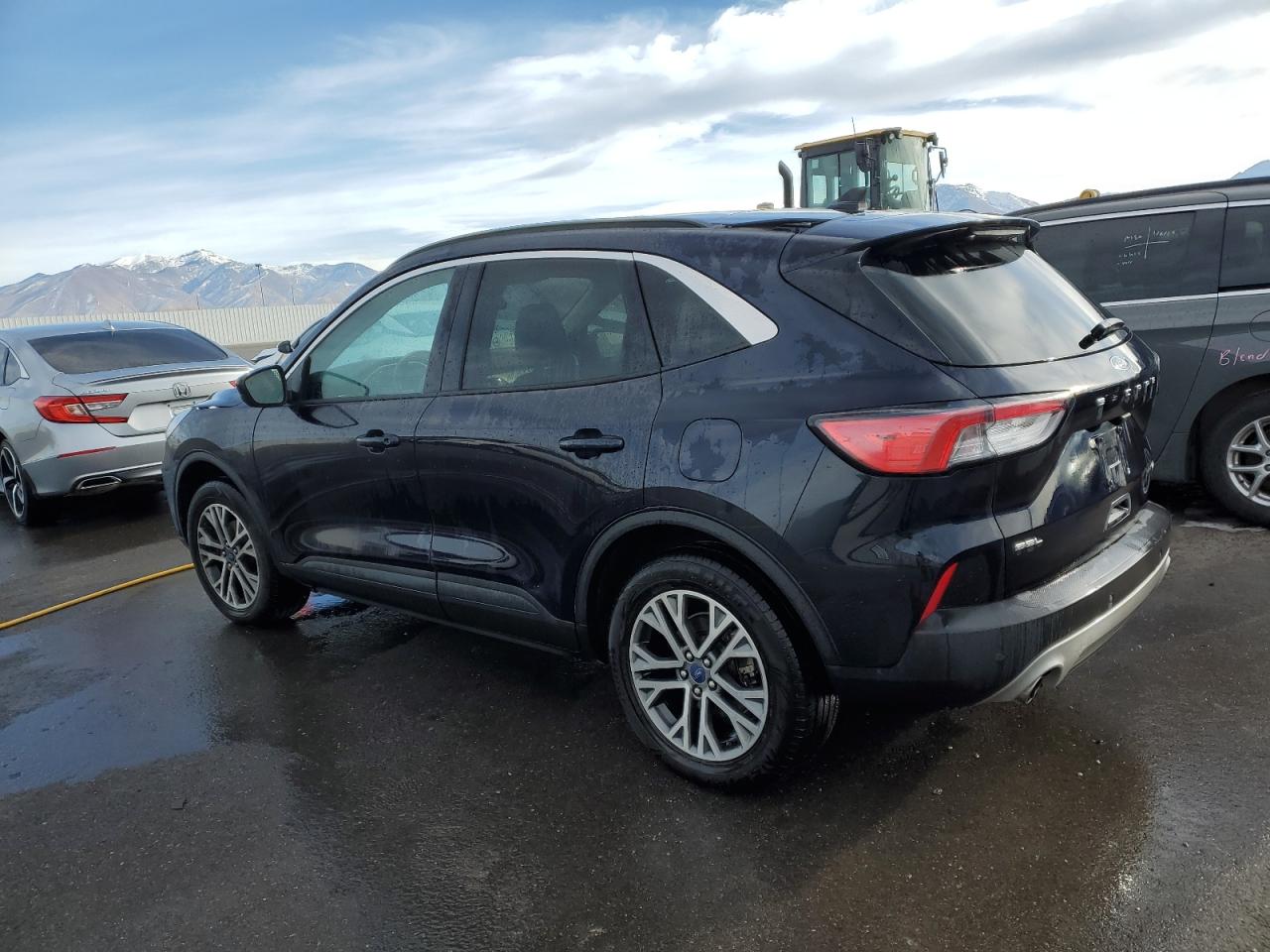 2021 Ford Escape VIN 1FMCU9H69MUA61159 Copart auction photo, top/roof damage thumbnail 2