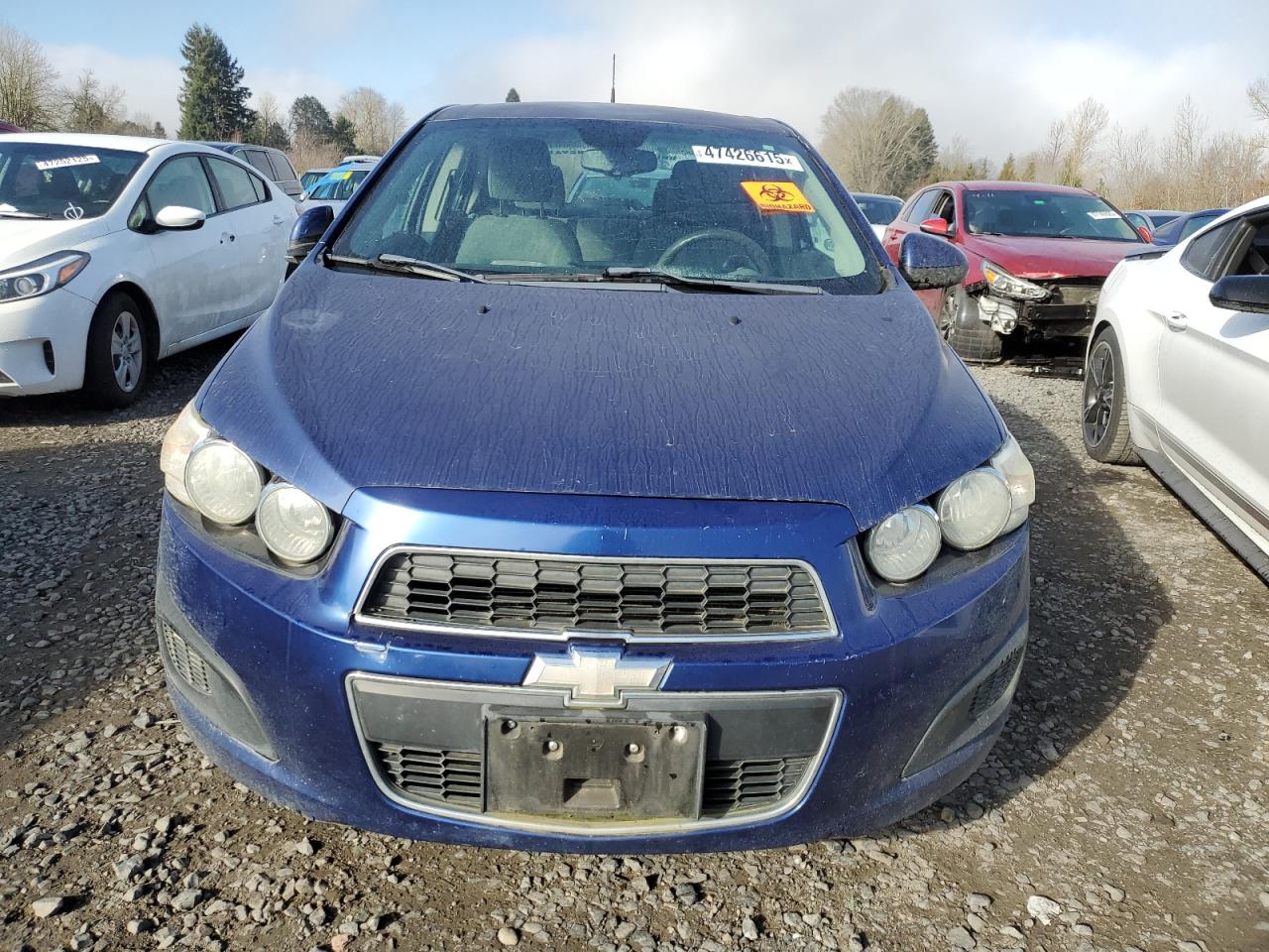 2013 Chevrolet Sonic VIN 1G1JD5SB6D4200750 Copart auction photo, biohazard/chemical / minor dent/scratches damage thumbnail 5