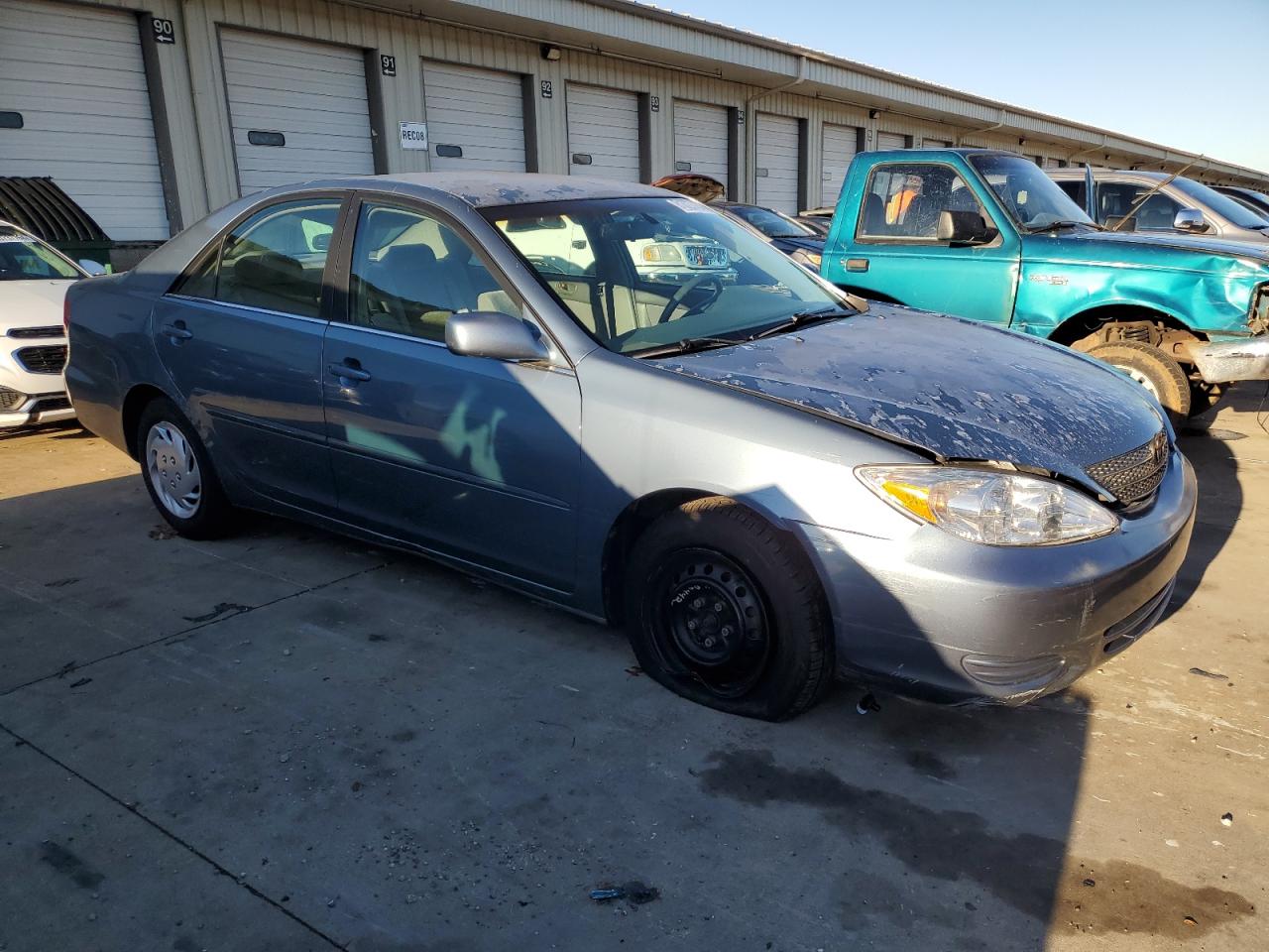 2002 Toyota Camry VIN 4T1BE32K12U553421 Copart auction photo, all over / minor dent/scratches damage thumbnail 4