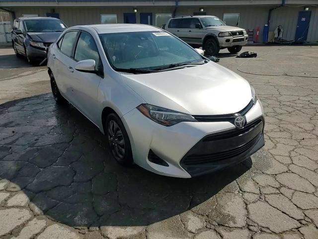 2018 Toyota Corolla VIN 5YFBURHE7JP855299 Copart auction photo, rear end damage thumbnail 13