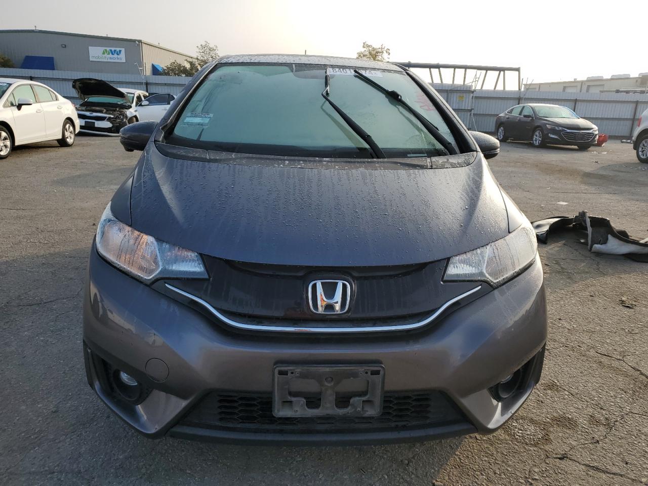 2015 Honda Fit VIN 3HGGK5H85FM763185 Copart auction photo, rear end damage thumbnail 5