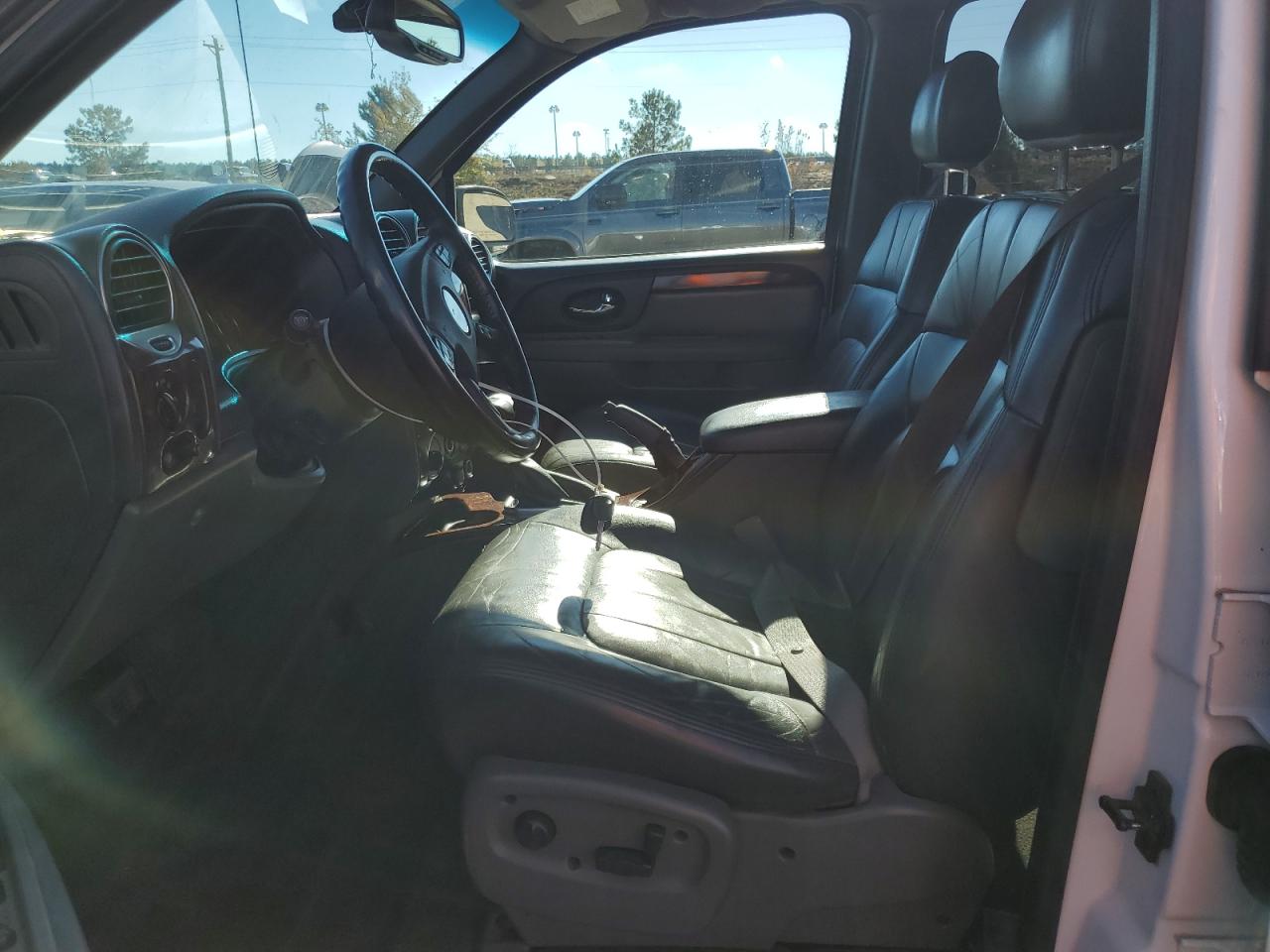 2004 GMC Envoy VIN 1GKDT13S042106538 Copart auction photo, side / front end damage thumbnail 7