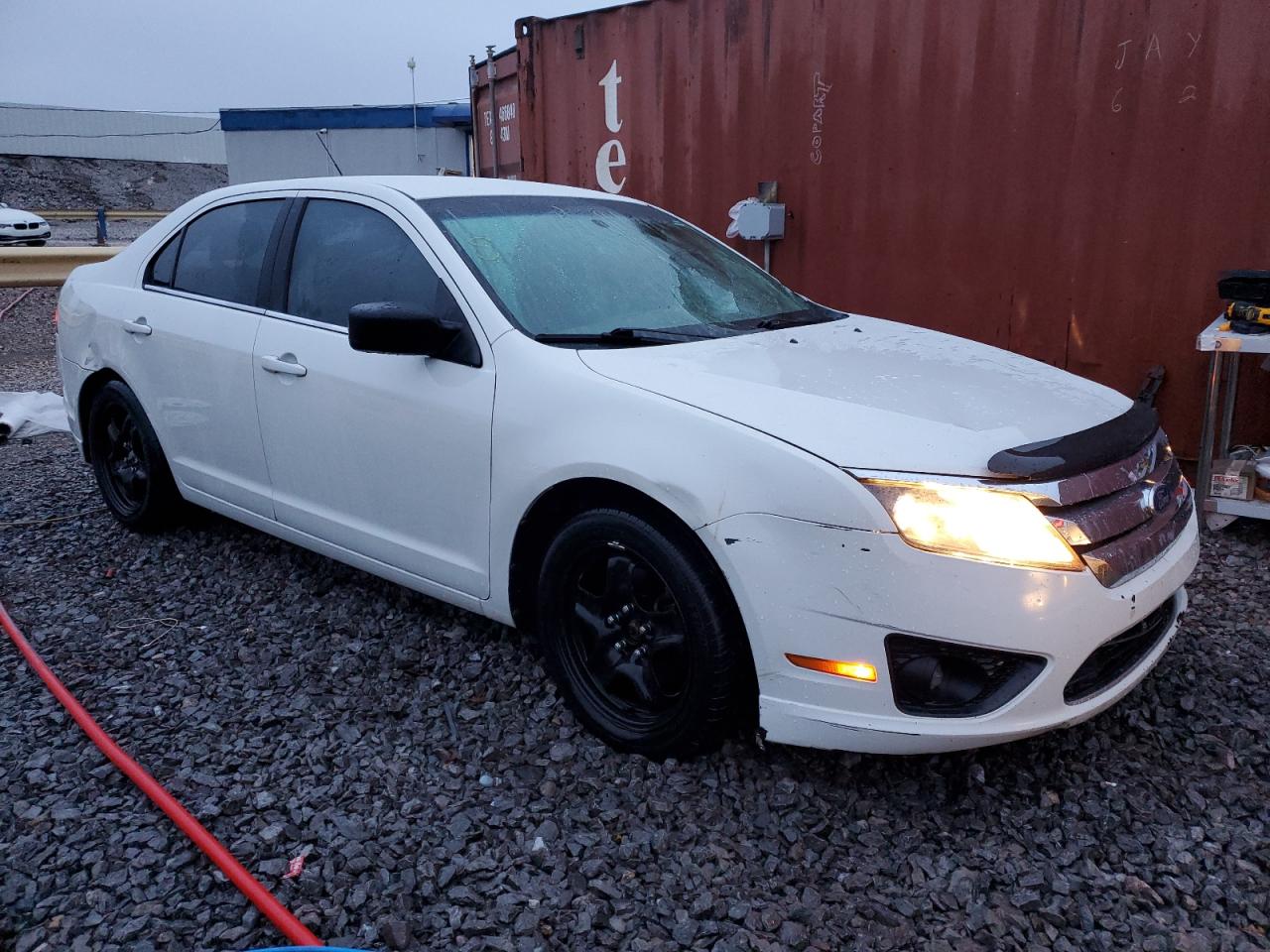 2011 Ford Fusion VIN 3FAHP0HA3BR166890 Copart auction photo, rear end / front end damage thumbnail 4