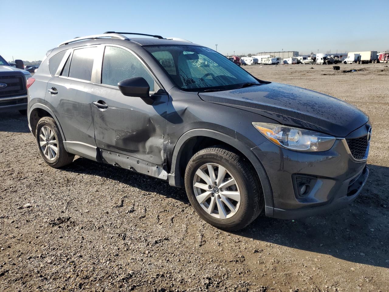 2014 Mazda CX-5 VIN JM3KE4CY7E0330249 Copart auction photo, side / minor dent/scratches damage thumbnail 4
