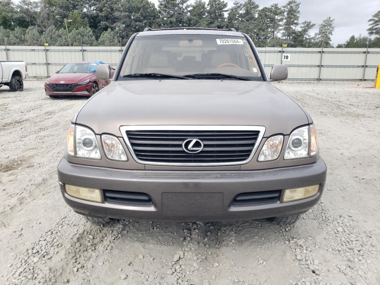 2000 Lexus LX VIN JT6HT00W6Y0109757 Copart auction photo, minor dent/scratches damage thumbnail 5
