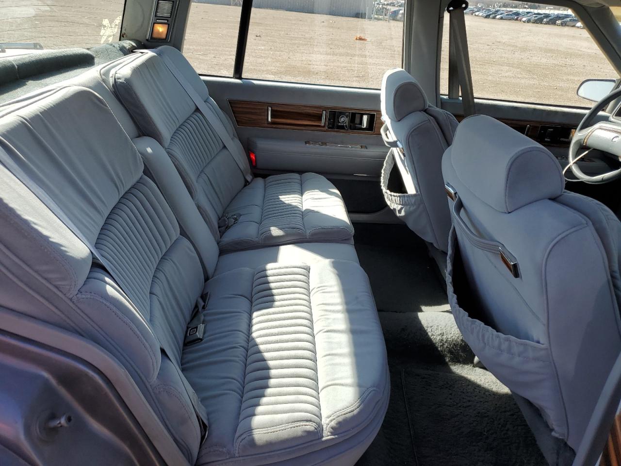 1990 Buick Park Avenue VIN 1G4CW54CXL1635282 Copart auction photo, front end / hail damage thumbnail 10