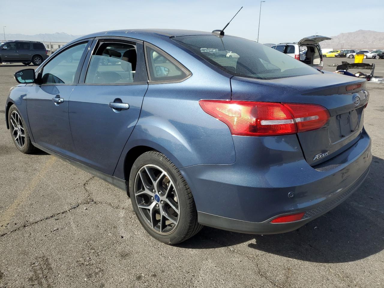 2018 Ford Focus VIN 1FADP3H21JL327176 Copart auction photo, front end damage thumbnail 2