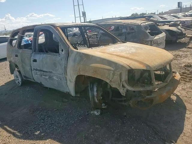 2004 GMC Envoy VIN 1GKDS13SX42112818 Copart auction photo, burn damage thumbnail 11