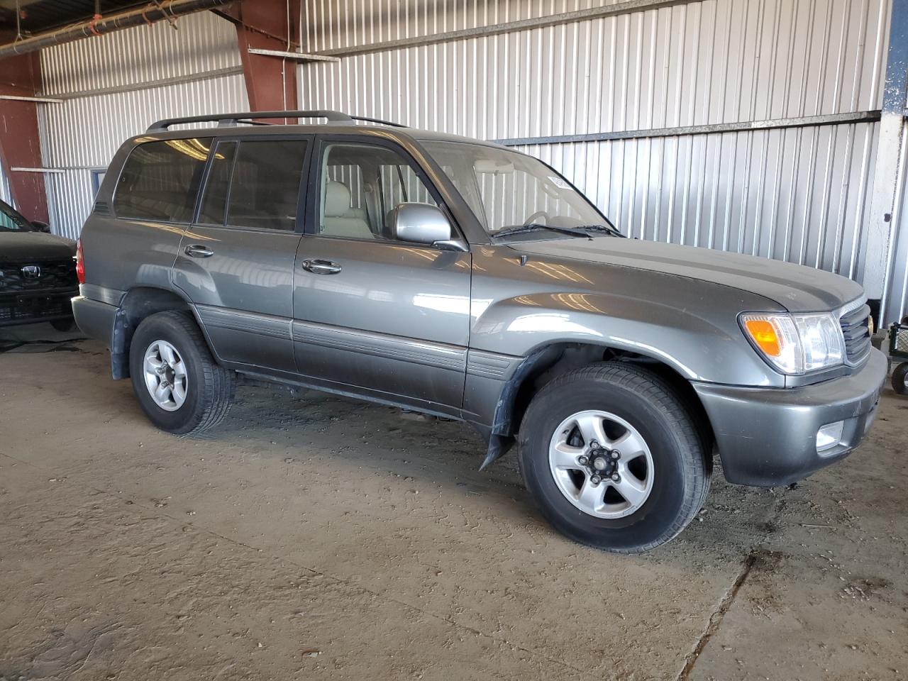 1998 Toyota Land Cruiser VIN JT3HT05J4W0011057 Copart auction photo, side damage thumbnail 4