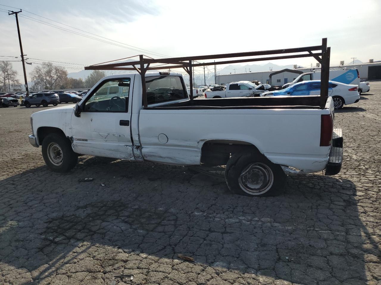 2000 Chevrolet GMT-400 VIN 1GCGC24RXYR197759 Copart auction photo, side / undercarriage damage thumbnail 2