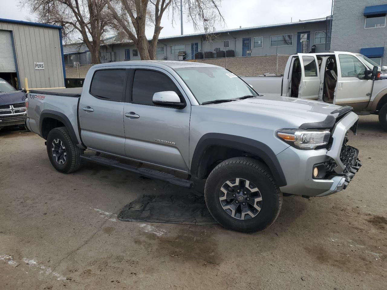 2022 Toyota Tacoma VIN 3TMCZ5AN7NM476213 Copart auction photo, front end damage thumbnail 4