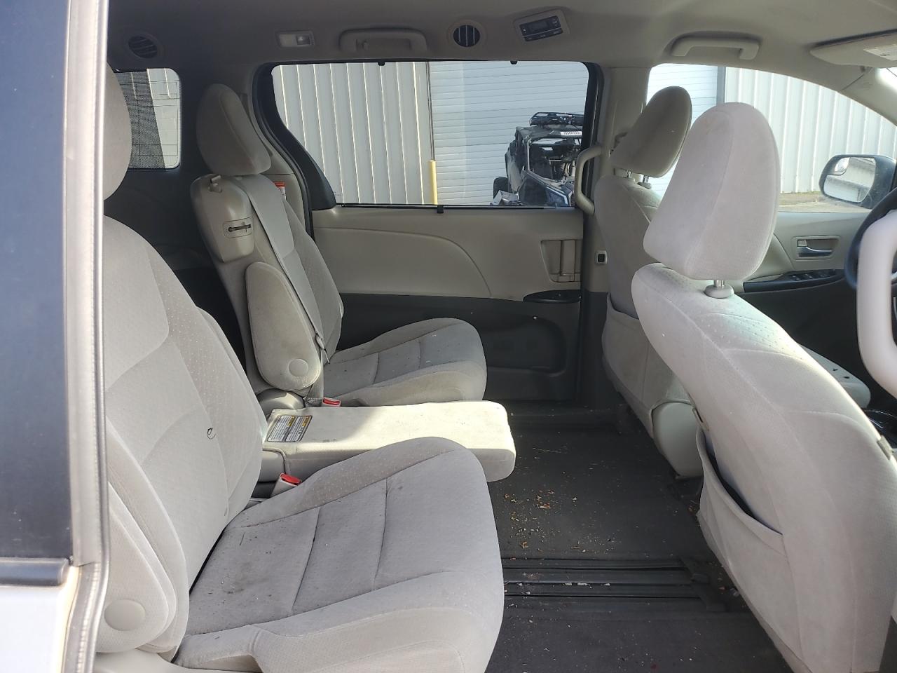 2015 Toyota Sienna VIN 5TDKK3DC2FS587011 Copart auction photo, front end / side damage thumbnail 10