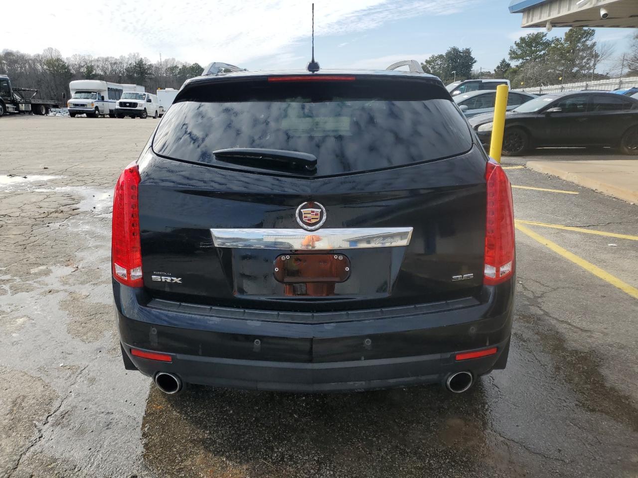 2016 Cadillac SRX VIN 3GYFNBE33GS561896 Copart auction photo, front end damage thumbnail 6