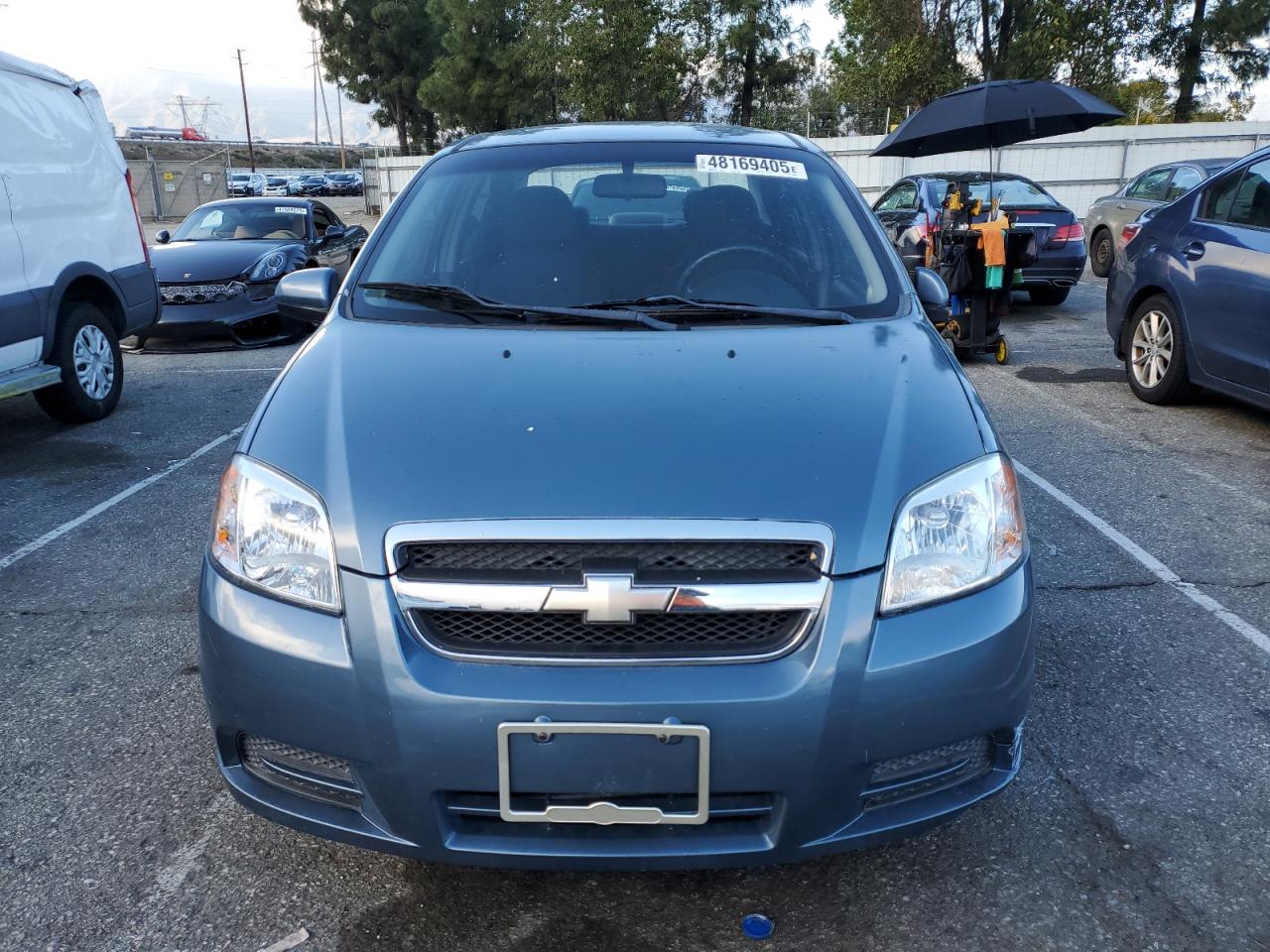 2009 Chevrolet Aveo VIN KL1TD56E29B368903 Copart auction photo, all over damage thumbnail 5