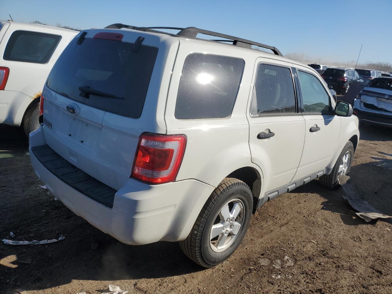2011 Ford Escape VIN 1FMCU0D77BKA27076 Copart auction photo, rear end / minor dent/scratches damage thumbnail 3
