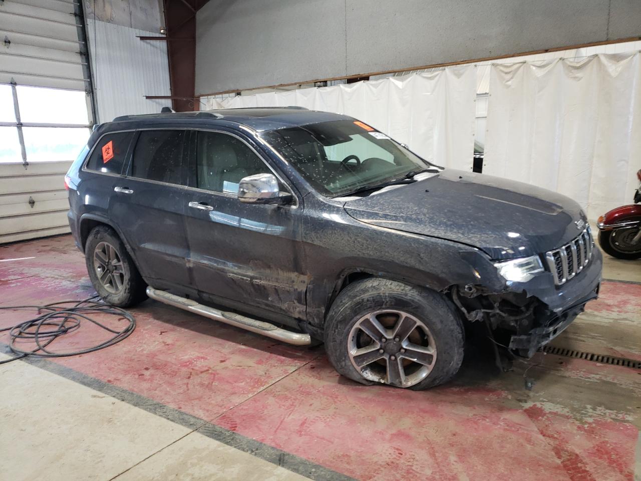 2019 Jeep Grand Cherokee VIN 1C4RJFBG1KC829596 Copart auction photo, front end / side damage thumbnail 4