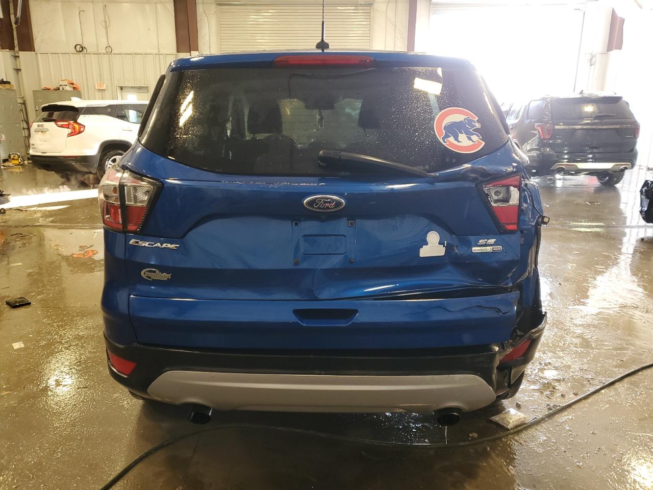 2017 Ford Escape VIN 1FMCU9G91HUB75190 Copart auction photo, rear end damage thumbnail 6