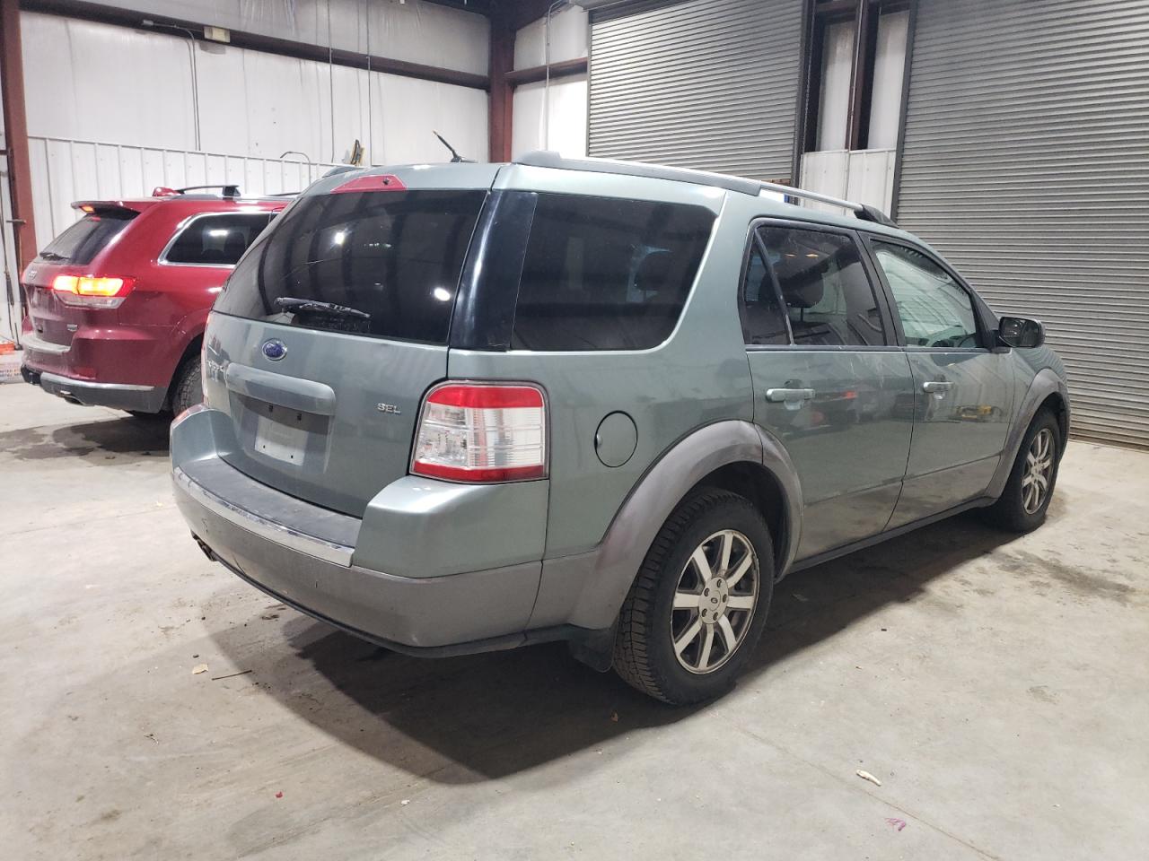 2008 Ford Taurus VIN 1FMDK02W28GA00562 Copart auction photo, minor dent/scratches damage thumbnail 3