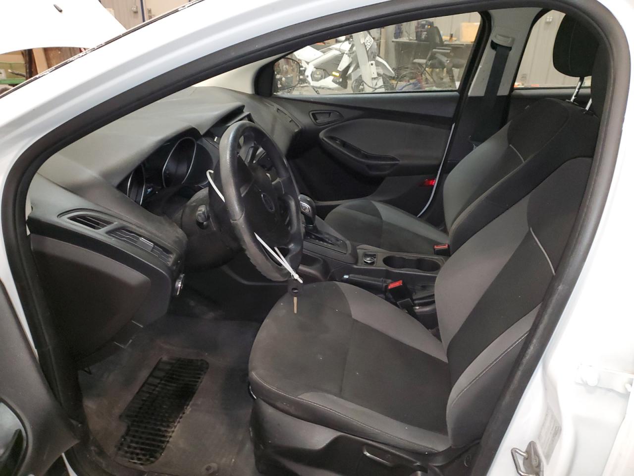2014 Ford Focus VIN 1FADP3E24EL289923 Copart auction photo, side / front end damage thumbnail 7