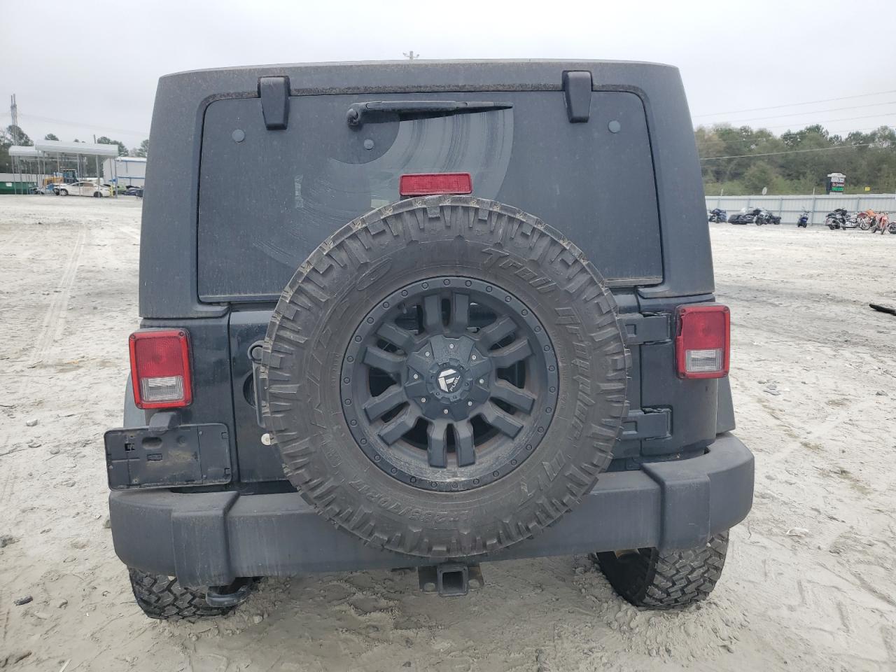 2012 Jeep Wrangler VIN 1C4AJWAG9CL253725 Copart auction photo, all over damage thumbnail 6