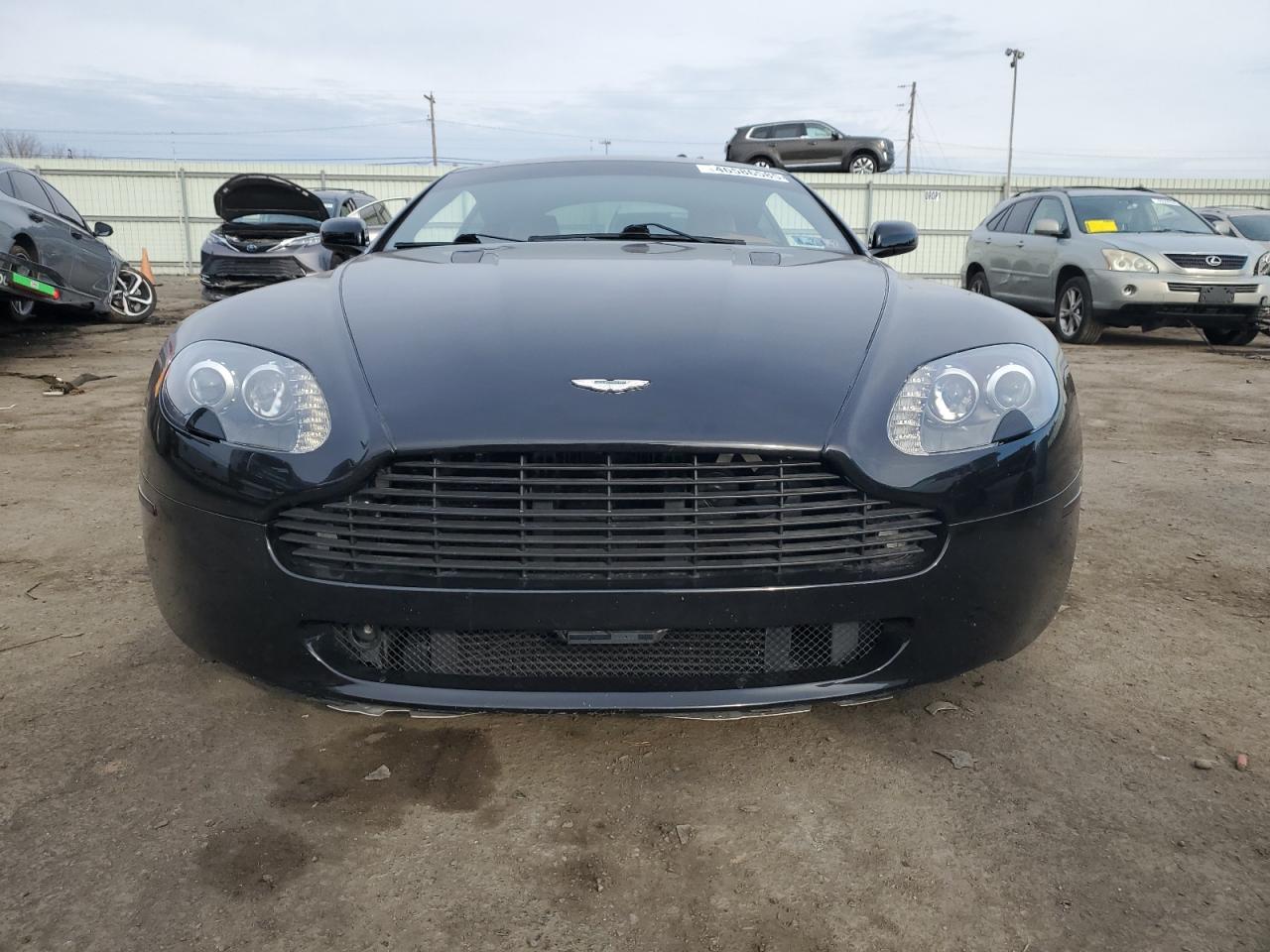 2007 Aston Martin Vantage VIN SCFBB03B17GC05817 Copart auction photo, undercarriage damage thumbnail 5