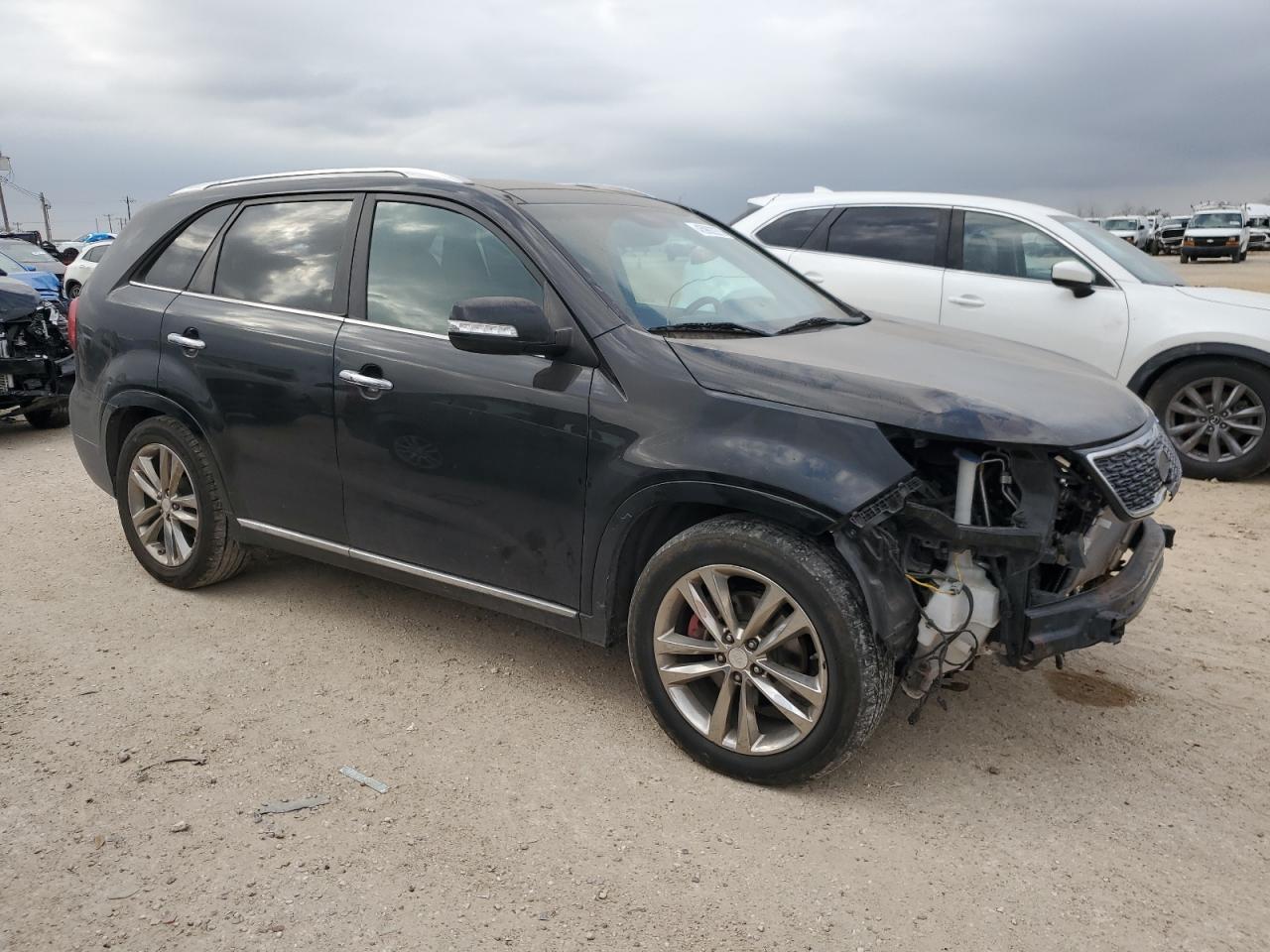 2015 KIA Sorento VIN 5XYKW4A79FG634727 Copart auction photo, front end / minor dent/scratches damage thumbnail 4