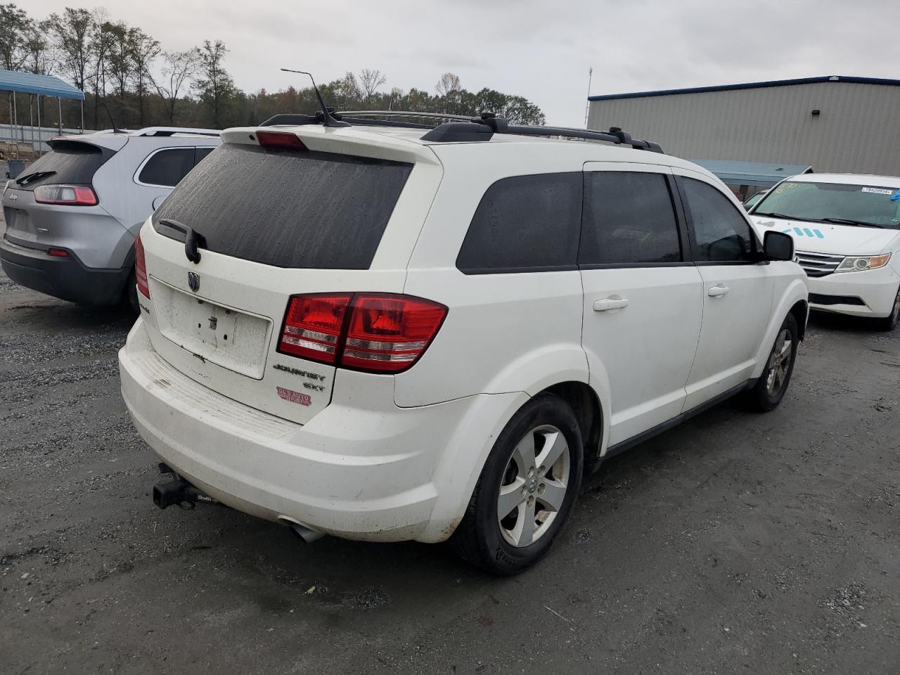 2010 Dodge Journey VIN 3D4PG5FV1AT180297 Copart auction photo, front end / rear end damage thumbnail 3