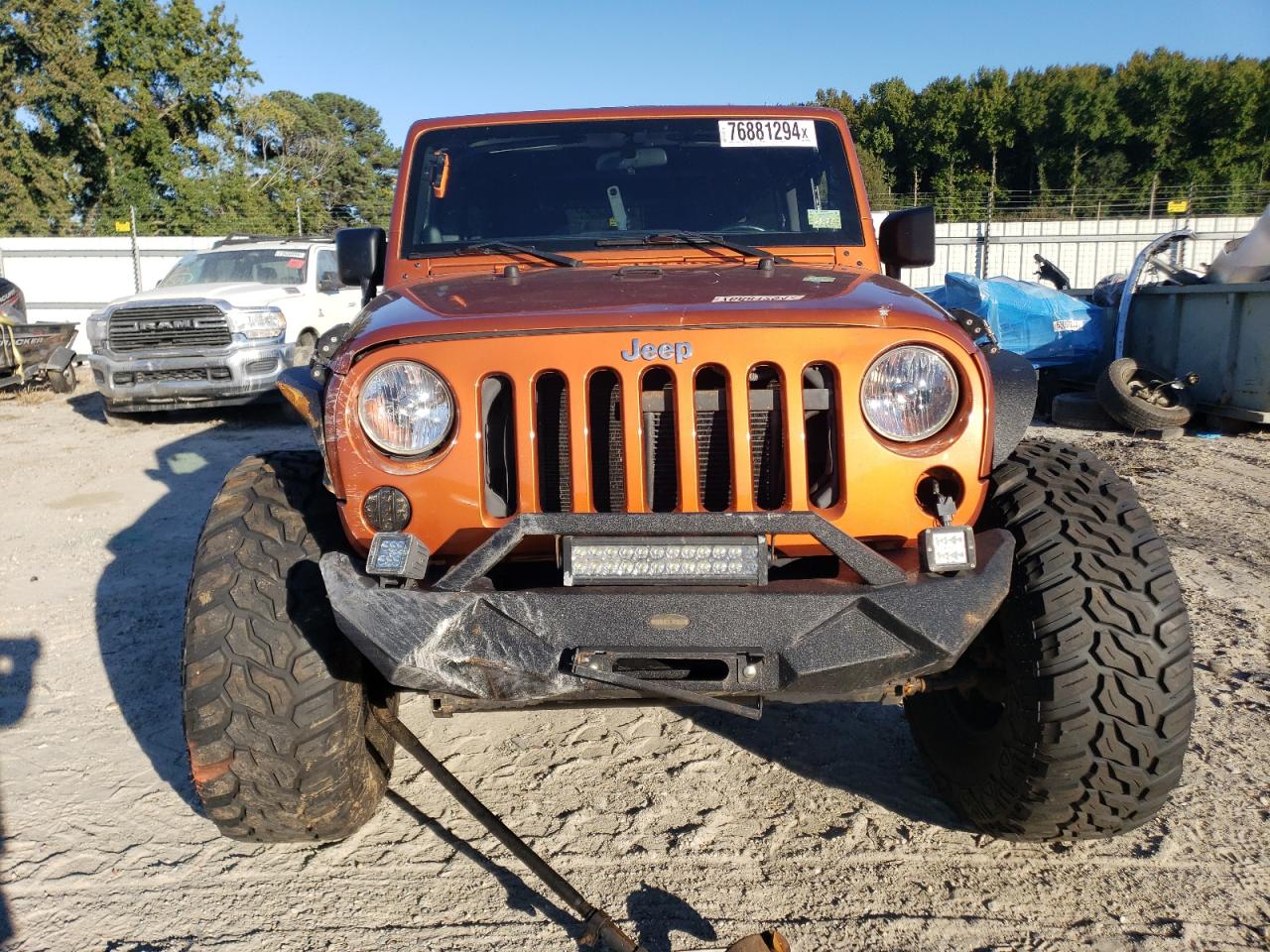 2011 Jeep Wrangler VIN 1J4BA3H19BL518107 Copart auction photo, front end damage thumbnail 5
