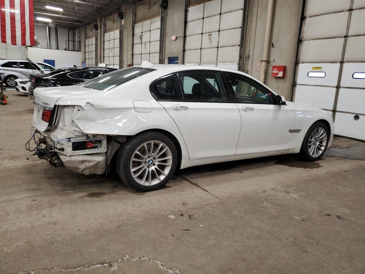2015 BMW 7er VIN WBAYB6C54FD965787 Copart auction photo, rear end / front end damage thumbnail 3