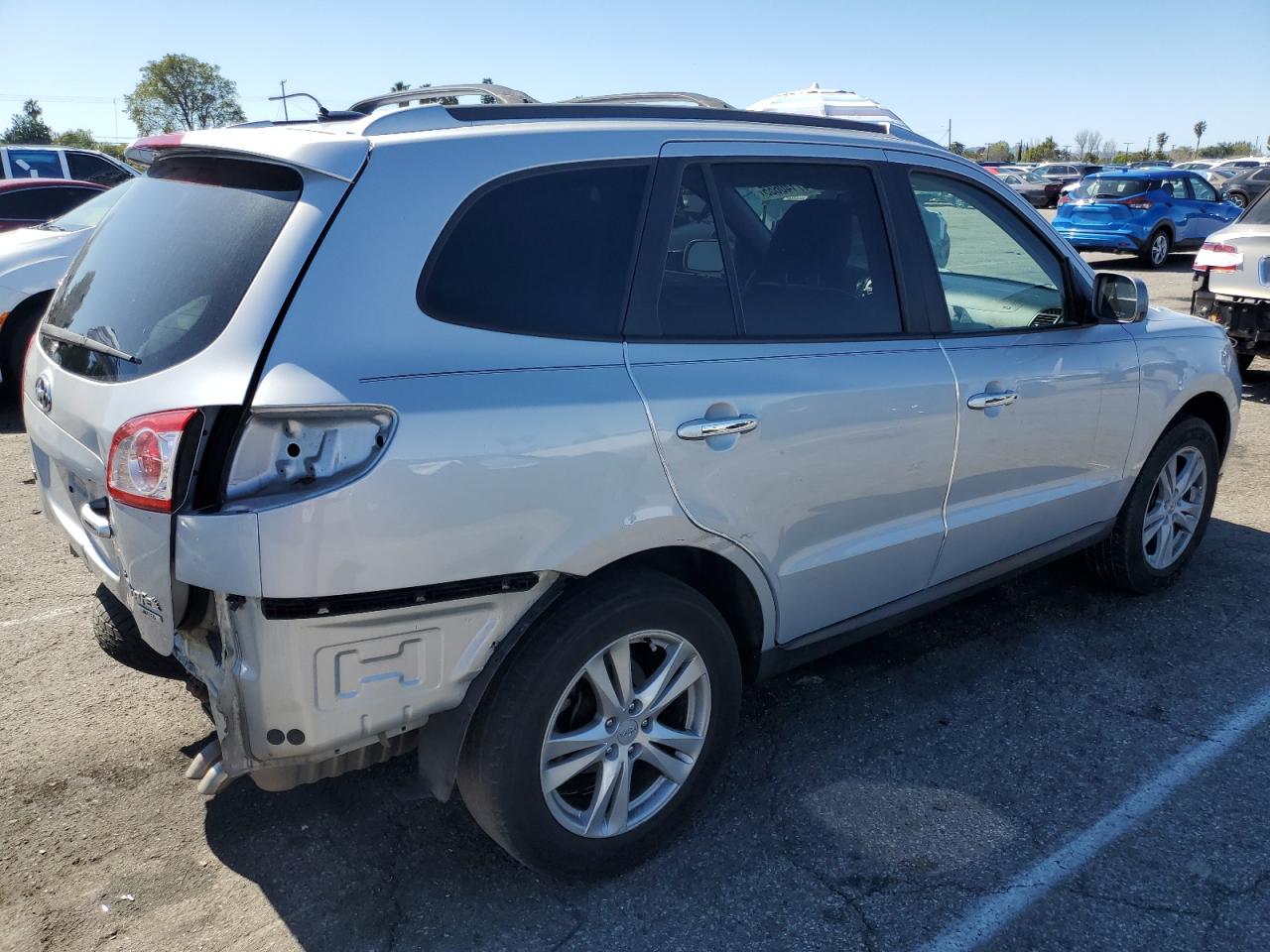 2010 Hyundai Santa Fe VIN 5NMSK4AG9AH385453 Copart auction photo, rear end / minor dent/scratches damage thumbnail 3