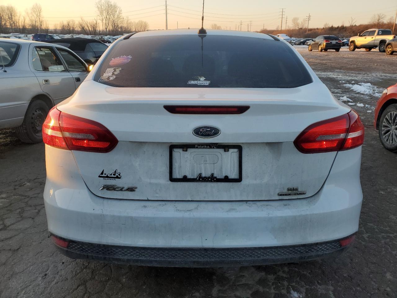 2015 Ford Focus VIN 1FADP3F28FL206655 Copart auction photo, all over damage thumbnail 6