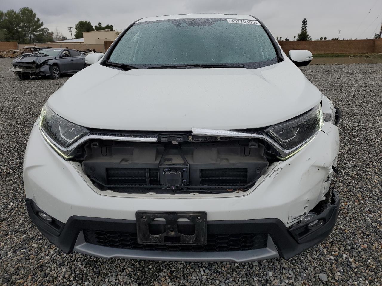 2019 Honda CR-V VIN 7FARW1H5XKE019675 Copart auction photo, front end damage thumbnail 5