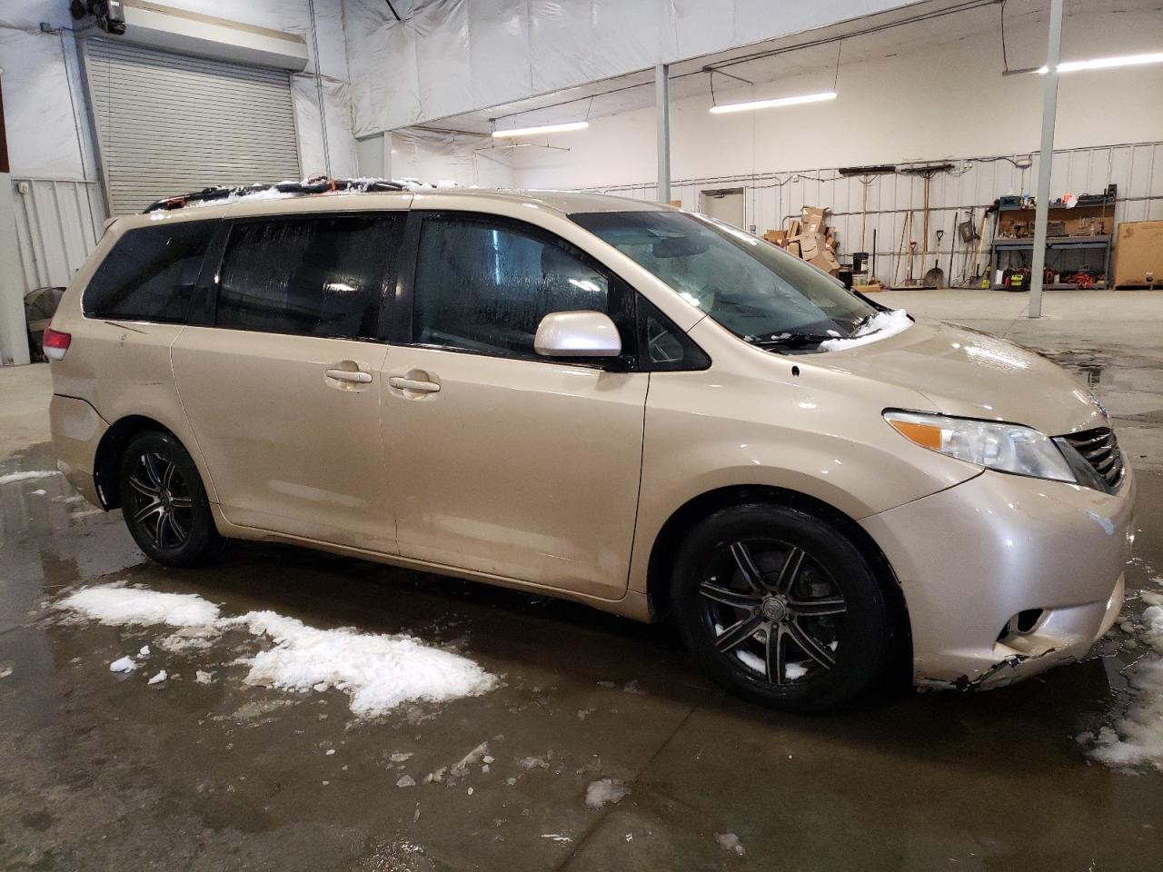 2011 Toyota Sienna VIN 5TDKK3DC7BS147103 Copart auction photo, all over damage thumbnail 4