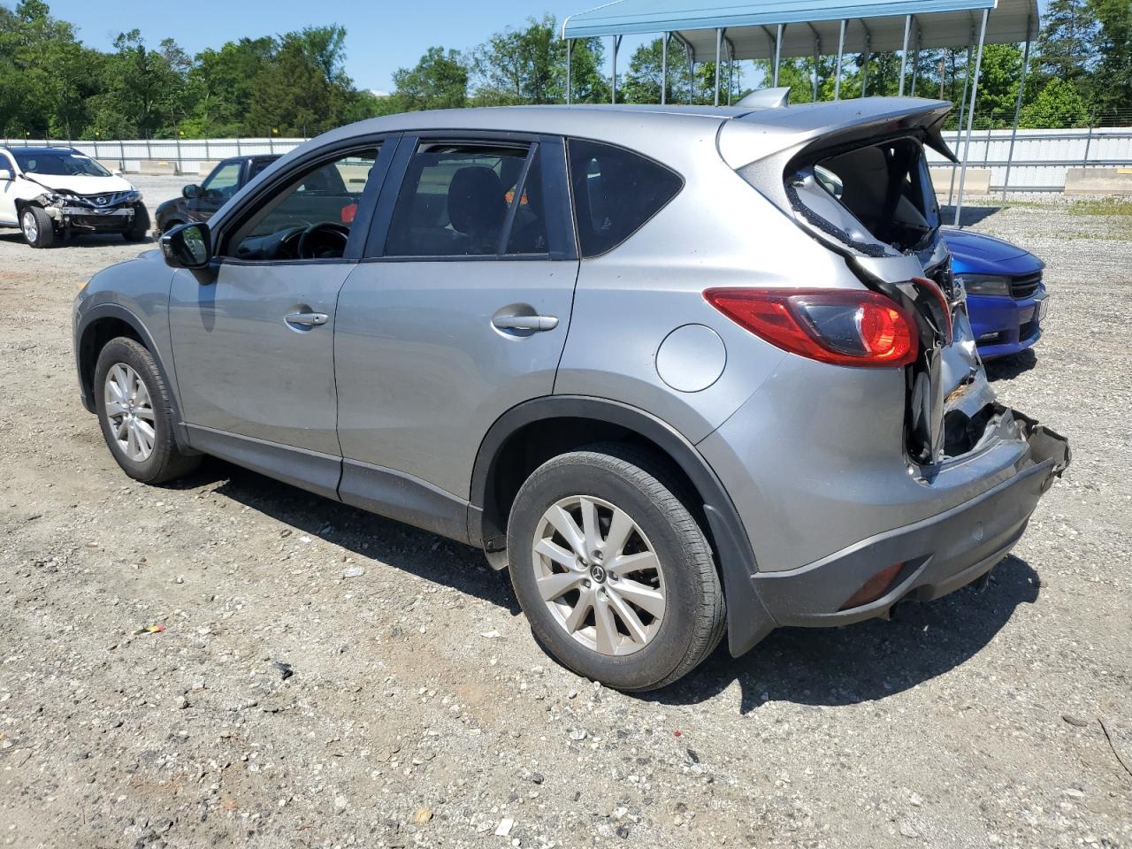 2014 Mazda CX-5 VIN JM3KE4CY9E0415402 Copart auction photo, all over damage thumbnail 2
