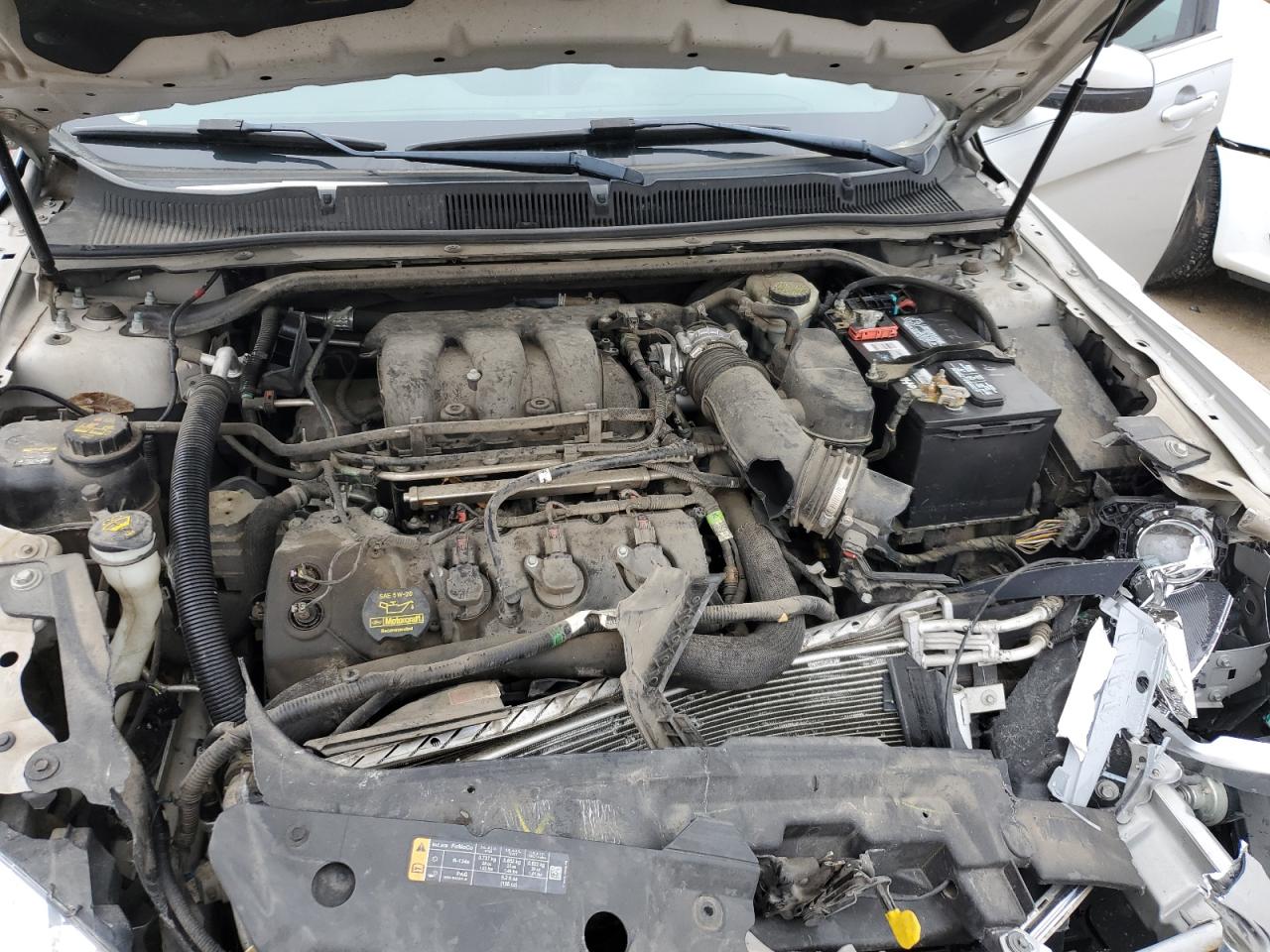 2013 Ford Taurus VIN 1FAHP2E8XDG224775 Copart auction photo, front end / side damage thumbnail 11