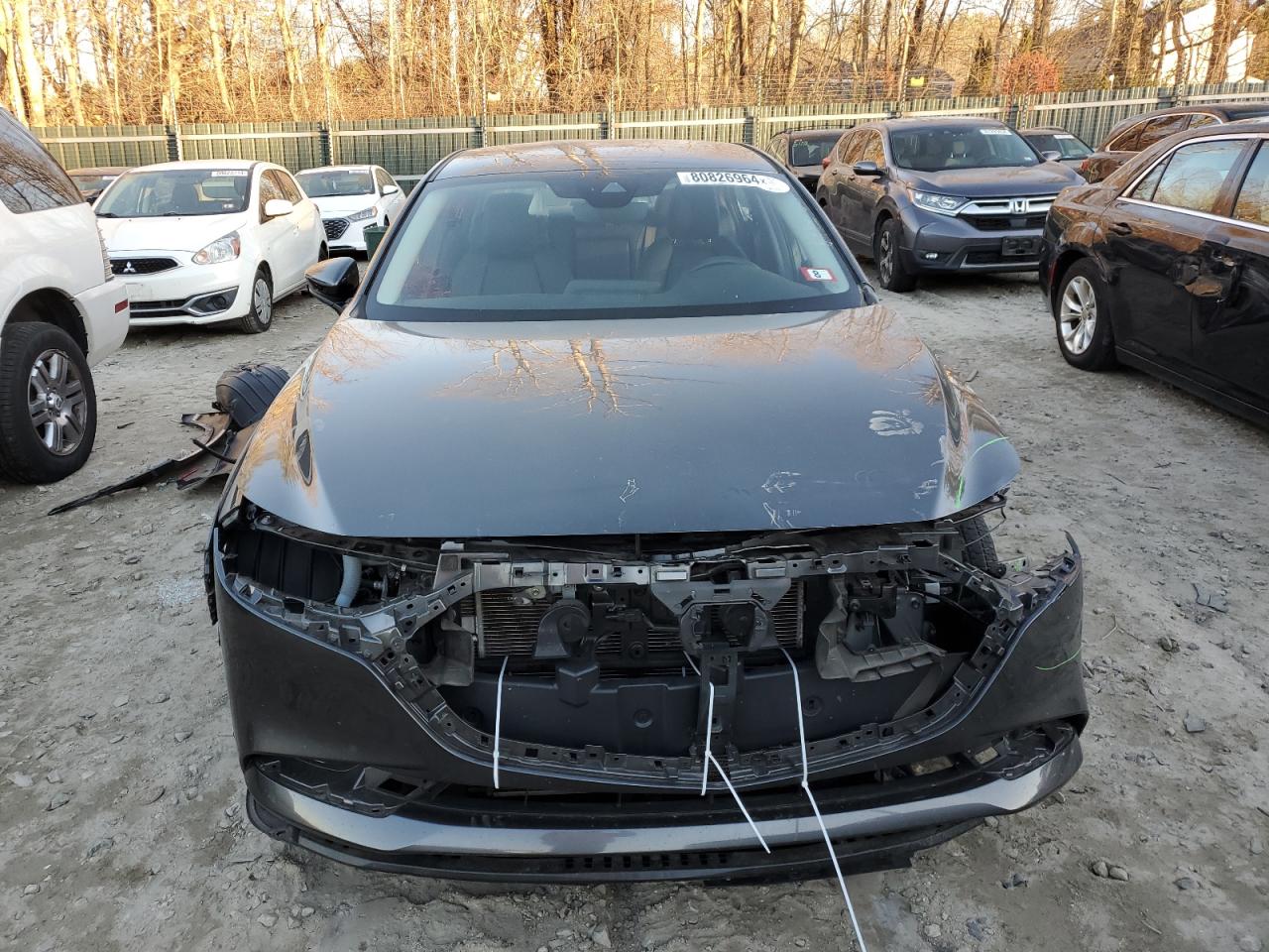2021 Mazda 3 VIN JM1BPBBL2M1314711 Copart auction photo, front end / stripped damage thumbnail 5