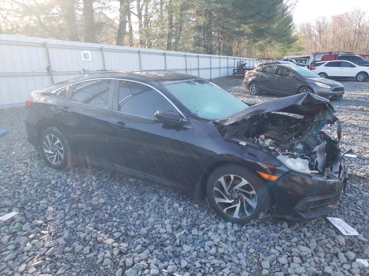 2017 Honda Civic VIN 19XFC2F7XHE201828 Copart auction photo, front end damage thumbnail 4