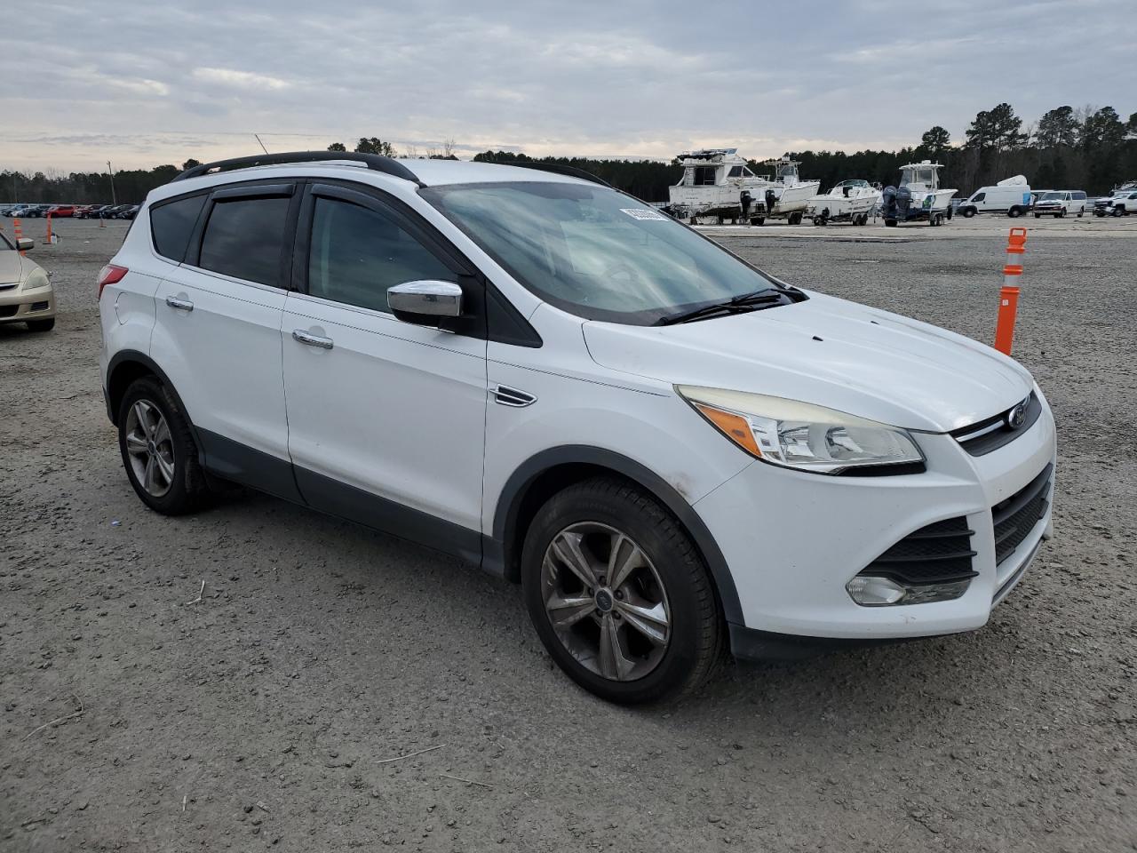 2014 Ford Escape VIN 1FMCU0GX0EUD35727 Copart auction photo, side / undercarriage damage thumbnail 4