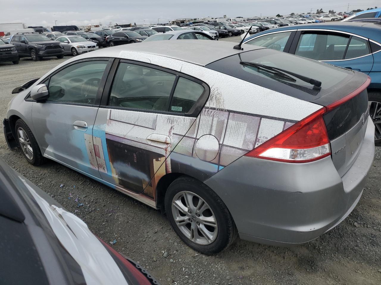 2010 Honda Insight VIN JHMZE2H76AS013281 Copart auction photo, all over damage thumbnail 2
