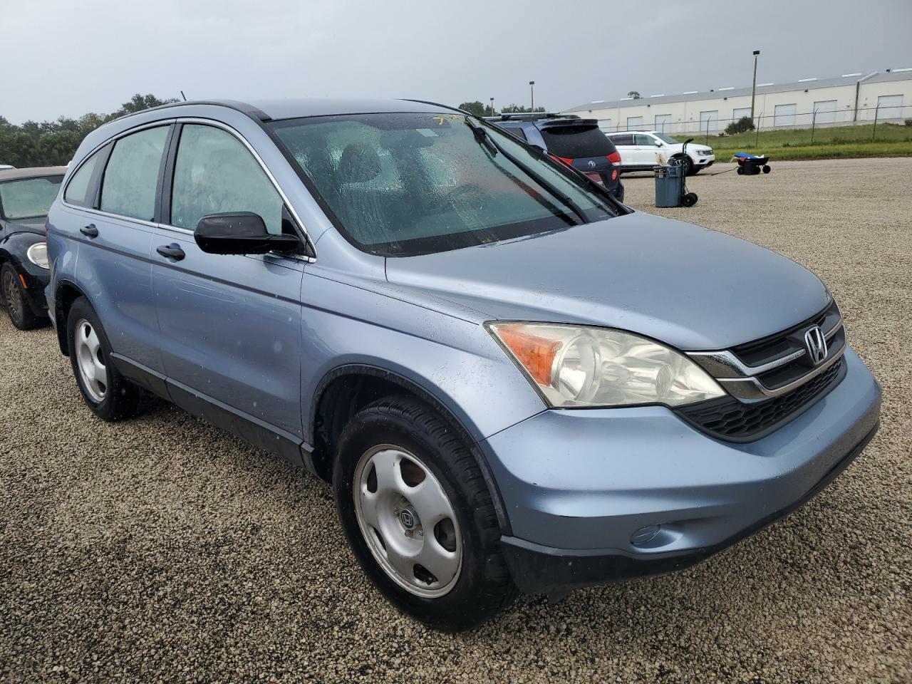 2010 Honda CR-V VIN 3CZRE3H32AG702059 Copart auction photo, water/flood damage thumbnail 4