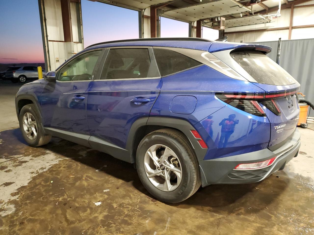 2022 Hyundai Tucson VIN 5NMJBCAE3NH069184 Copart auction photo, side / rear end damage thumbnail 2