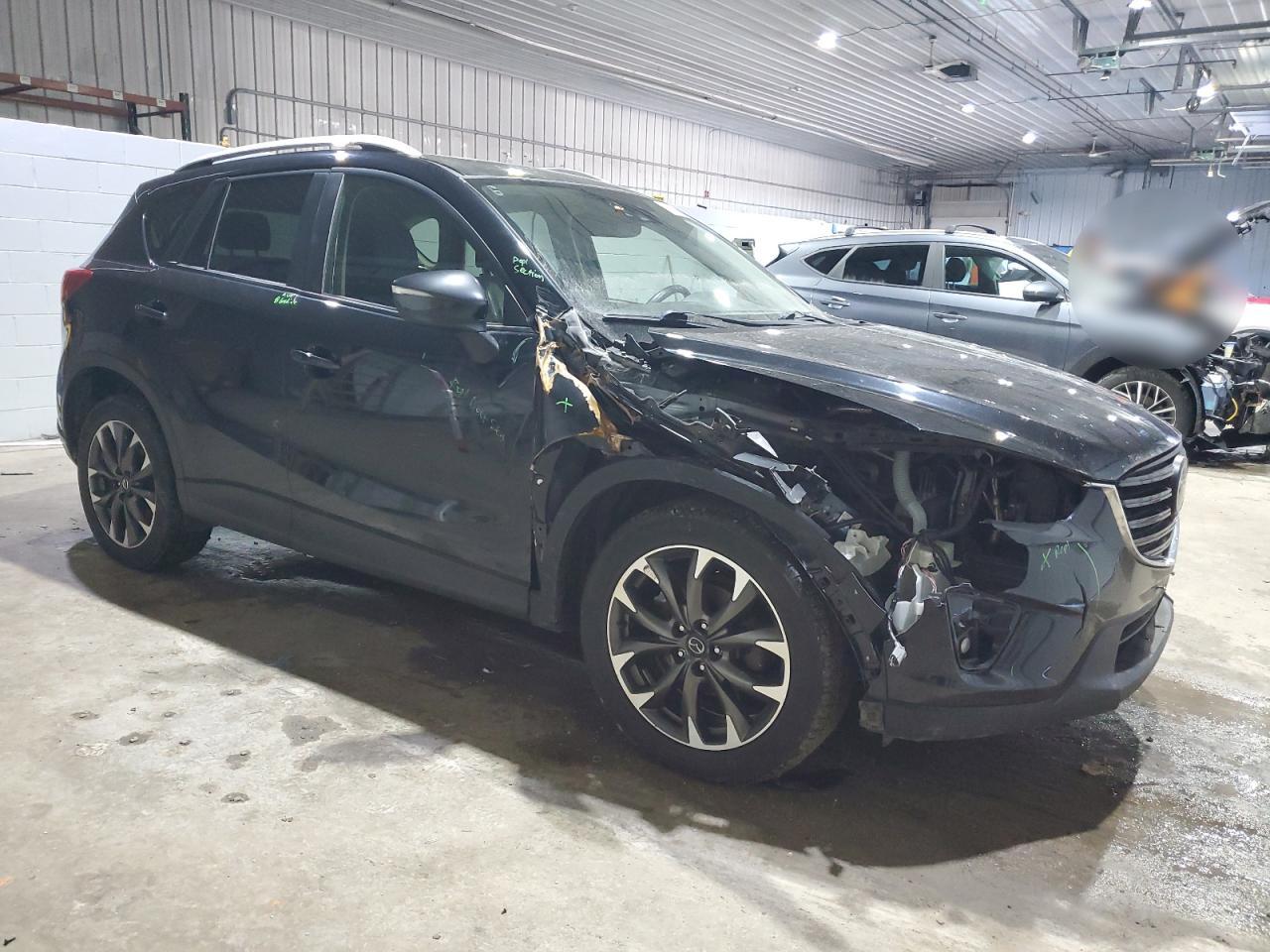2016 Mazda CX-5 VIN JM3KE4DY3G0675358 Copart auction photo, front end / minor dent/scratches damage thumbnail 4