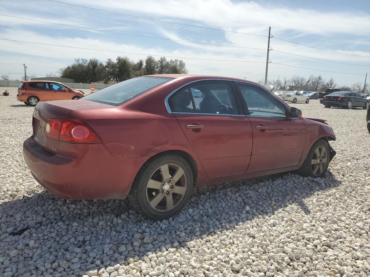 2006 KIA Optima VIN KNAGE123365056357 Copart auction photo, front end / minor dent/scratches damage thumbnail 3