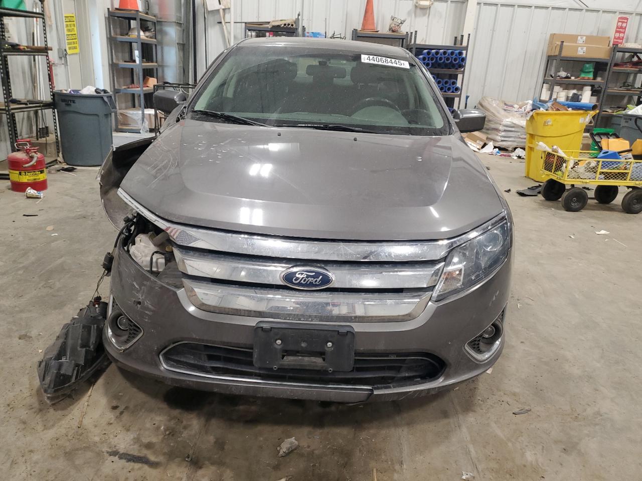 2012 Ford Fusion VIN 3FAHP0JA8CR111170 Copart auction photo, front end / minor dent/scratches damage thumbnail 5