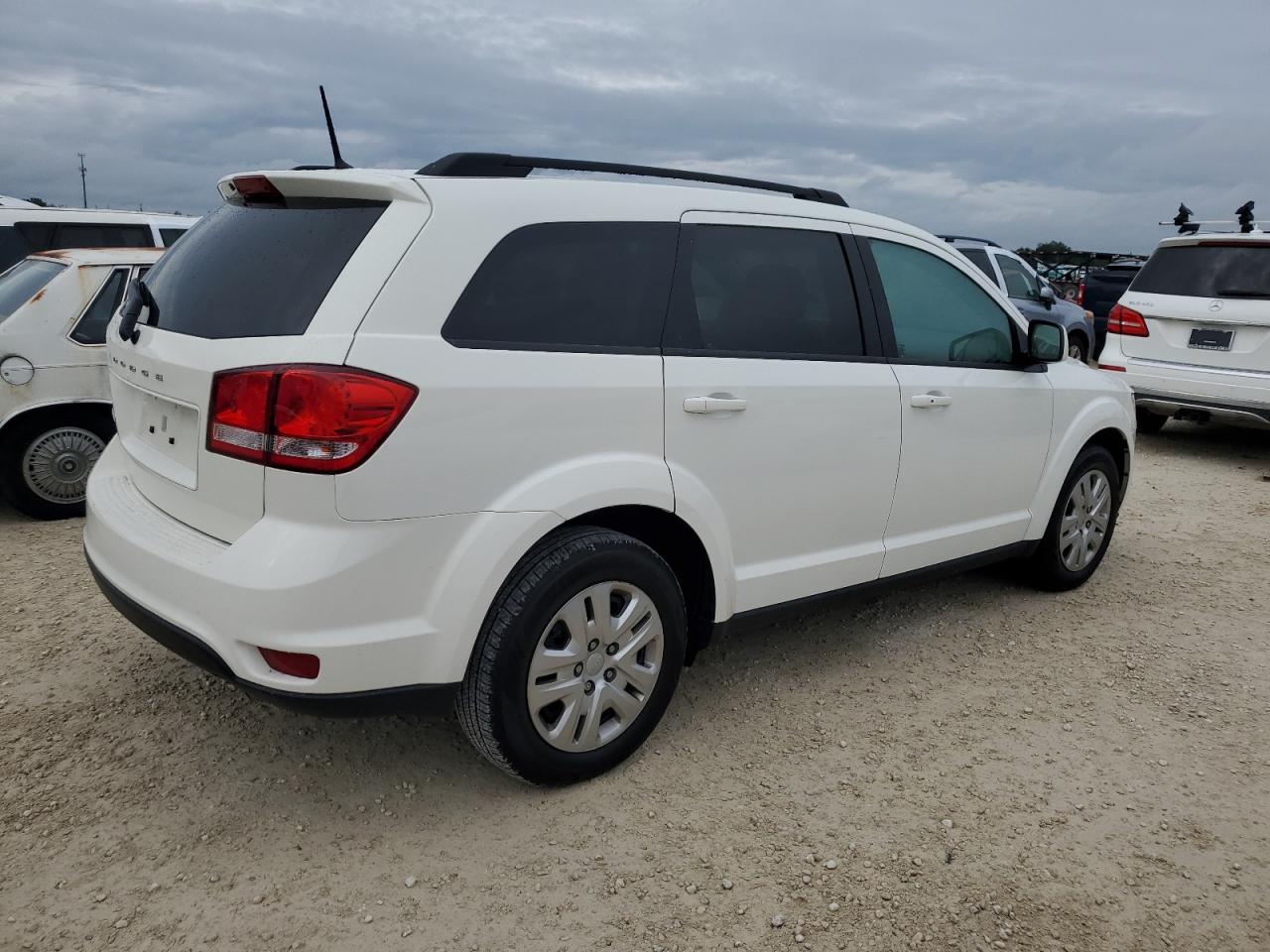 2019 Dodge Journey VIN 3C4PDCBB4KT852599 Copart auction photo, water/flood damage thumbnail 3
