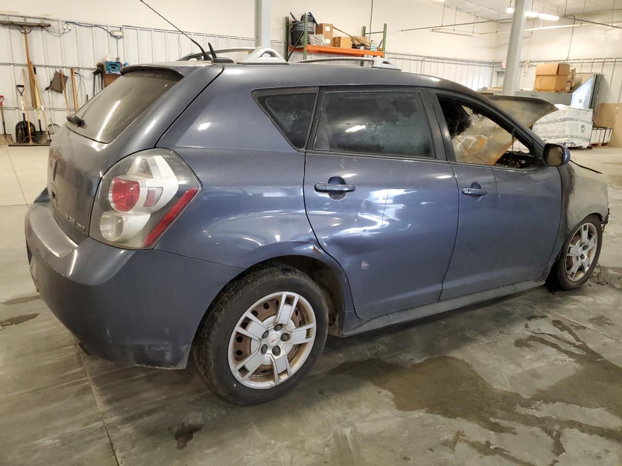2009 Pontiac Vibe VIN 5Y2SM67039Z411455 Copart auction photo, burn damage thumbnail 3