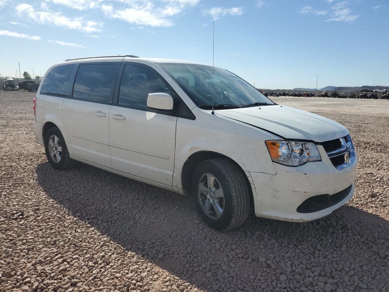 2012 Dodge Caravan VIN 2C4RDGCG9CR211866 Copart auction photo, front end / side damage thumbnail 4
